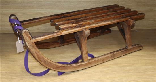 A vintage childs sledge stamped Davos